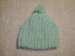 http://crystalsbabyblankets.com/pics/Pale Green knit hat BALL.JPG